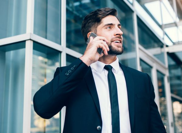 A business traveller talking on the phone